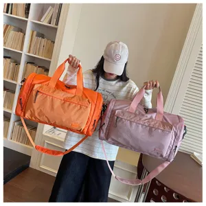 Large capacity waterproof travel duffel bag with dry wet separation for short trips fitness.
