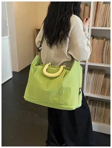 Large capacity travel bag for women, waterproof, expandable, stylish single shoulder bag.