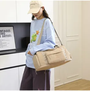 Large capacity canvas travel duffel bag with shoulder strap, waterproof casual luggage bag.