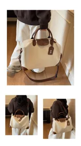 Grosse kapazitaet reise reisetasche wasserdichtes segeltuch gepaecktasche mit braunen lederdetails.