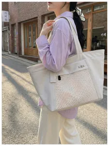 Casual large tote bag for women, commuter shoulder bag with mesh pocket and stylish letter print.