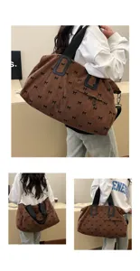 Braune Kord Reisetasche mit schwarzem Schleifenmuster, grosse Umhaengetasche fuer Damen.