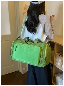 Green travel duffel bag with large capacity and dry wet separation design detail view