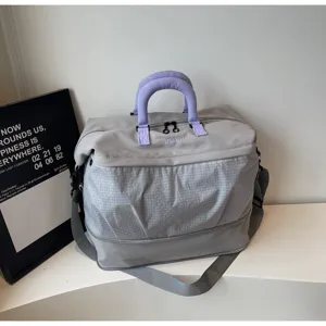 Expandable sports fitness duffel bag, large capacity short trip travel tote in grey purple.