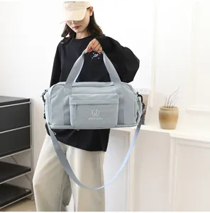 Large capacity travel duffel bag with shoulder strap, waterproof gym bag for men and women.