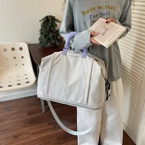 Large capacity travel bag for women, short trips, lightweight shoulder messenger bag.