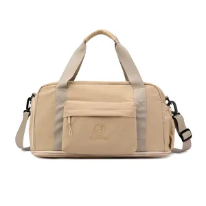 Large capacity waterproof travel duffel bag with shoulder strap for gym and weekend trips.