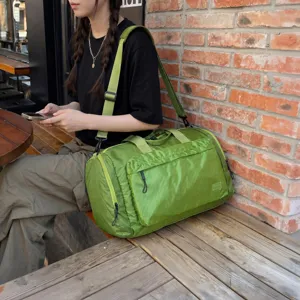 Waterproof large capacity travel duffel bag for gym and short trips, stylish green storage bag.