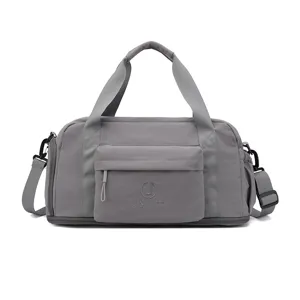 Waterproof travel duffel bag for gym, sports, and weekend trips with large capacity.