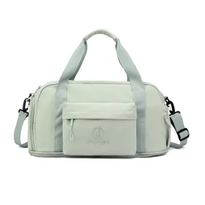 Large capacity waterproof travel duffel bag with shoulder strap in light green color.
