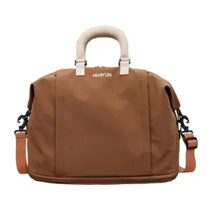 Large capacity travel duffel bag for women, waterproof short trip business luggage shoulder bag.