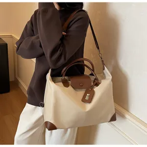 Große Reise-Duffle-Bag mit braunen Lederdetails, lässige, leichte Umhängetasche.