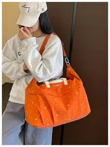 Expandable travel duffel bag with cute polka dot bow pattern, wet dry separation gym bag.