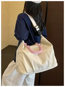 Expandable travel duffel bag with cute pink bow pattern, large capacity fitness gym bag.