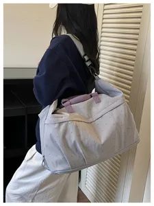 Expandable travel bag with dry-wet separation, perfect for gym, fitness, and weekend trips.