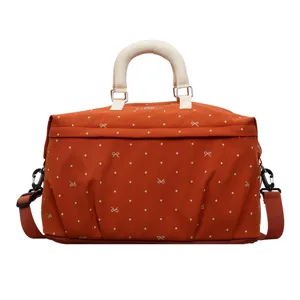 Expandable travel duffel bag with cute polka dot bow print, dry wet separation fitness bag for gym.