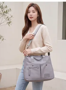 Grijs nylon schoudertas shopper detail, casual woon-werk handtas met voorzakken.