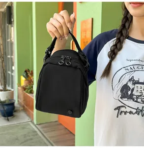 Kleine zwarte schoudertas schattige eitje tas lichtgewicht crossbody tas voor dagelijkse reizen
