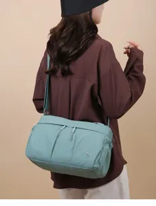 Sac bandoulière en nylon décontracté avec multi poches, grand sac de voyage pour femmes.