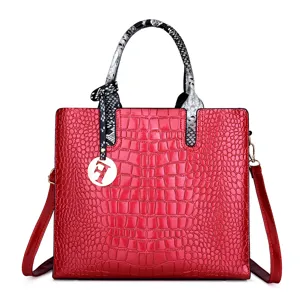 Stylish red crocodile pattern handbag with snakeskin handles and large capacity tote design.