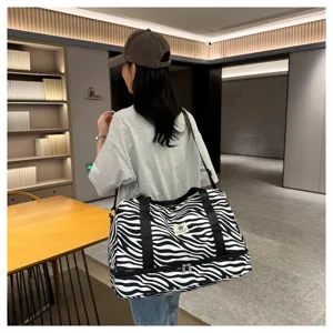 Gran capacidad bolso de viaje a rayas de cebra, bolsa de equipaje portátil ligera para viajes.