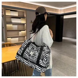 Bolso de viaje de rayas grande con asa para maleta de mujer ligero y muy práctico.