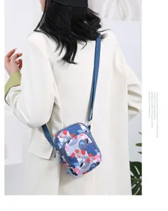 Sac bandoulière téléphone en nylon fleuri pour femme, mini sac vertical avec sangle réglable.