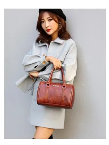 Elegante bruine Boston handtas voor dames, modische schoudertas van hoogwaardig kunstleer.
