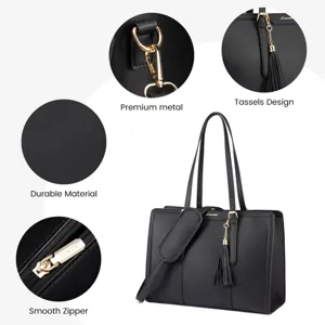 Detailed view of the black tote bag highlighting premium metal hardware and smooth zipper.