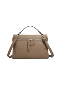 Taupe leather top handle bag with adjustable shoulder strap, stylish daily crossbody bag.