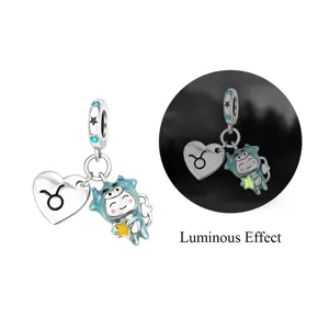 Silver plated Taurus zodiac charm pendant with cute cartoon character and luminous effect.