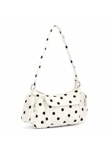 Close-up detail view of the white nylon polka dot hobo shoulder bag with pockets.