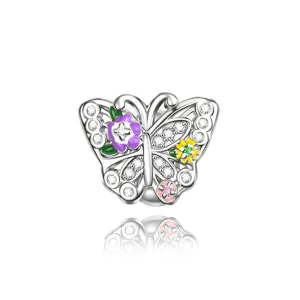 Exquisite silver butterfly charm bead with sparkling cubic zirconia and colorful enamel flowers detail.