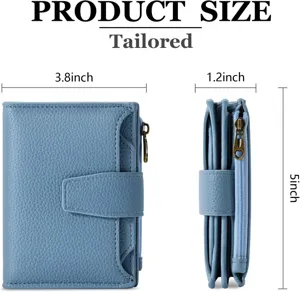 Portafoglio donna in pelle blu multi-tasche con tasca con zip e design compatto.