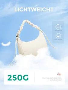 Sac bandoulière matelassé blanc avec lanière ajustable, sac fourre-tout quotidien léger.