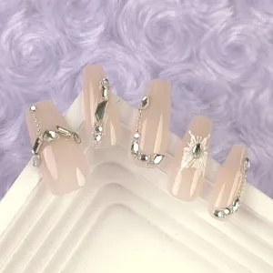 Exquisite long trapezoid press-on nails featuring delicate rhinestones and white butterfly details.