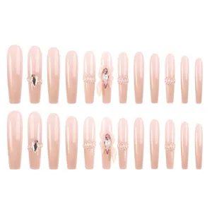 Set de uñas press-on degradado nude uñas largas tipo ataúd con diamantes y lazos 24 p
