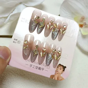 Uñas postizas hechas a mano 10pcs ojo de gato serpiente oro cristales lujo manicura arte
