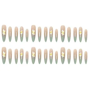 Closeup detail of 3d floral press on nails set, elegant gradient finish, artisan crafted.