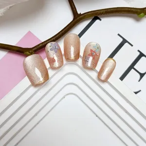 Uñas postizas hechas a mano con gel ojo de gato, pedrería floral colorida para estilo elegante.