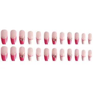 Uñas postizas largas de bailarina rosa con estrás de corazón elegante y set