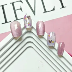 Uñas postizas ojo de gato rosa con diseño de diamantes de imitación flores hechas a mano
