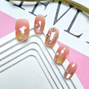 Detail view of 3d tulip press-on nails featuring cat eye gel and rhinestones on a white stand.