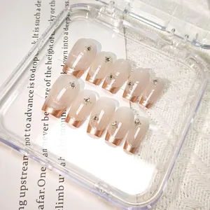 Handmade cat-eye press-on nails detail, elegant French diamond trapezoid false nail set.