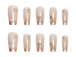 Elegant trapezoid press-on nails with cat eye effect and sparkling rhinestones for chic style.