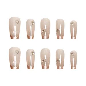 Elegant nude cat-eye press-on nails with tiny rhinestones, long trapezoid shape for daily wear.