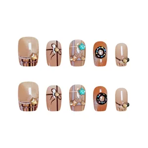 Uñas postizas cortas con diseño de cuadros lazo y rosquilla, set de uñas de gato 10pcs