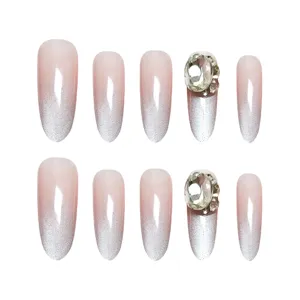 Uñas postizas elegantes 10pcs óvalo largo rosa nude degradado ojo de gato con pedrería