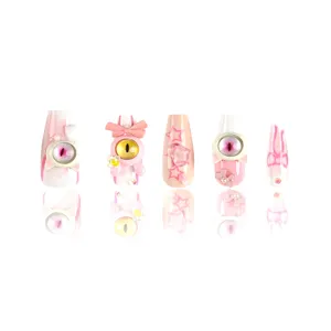 Set di unghie finte rosa dopamina 10pz con simpatici occhi di mostro 3d e graziosi fiocchi.