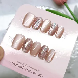 Handmade short trapezoid press-on nails set with elegant champagne cat eye and sparkling glitter
